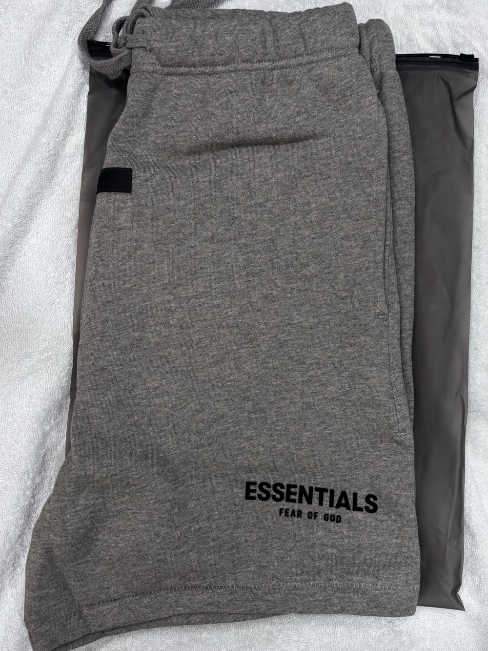Fear of God ESSENTIALS dark otm shorts with Black Logo